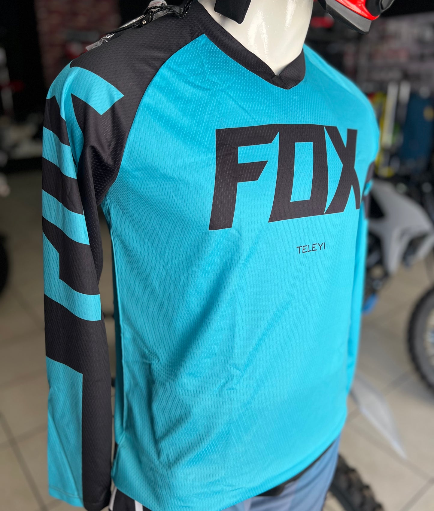 JERSEY FOX TELEYI AZUL TURQUESA